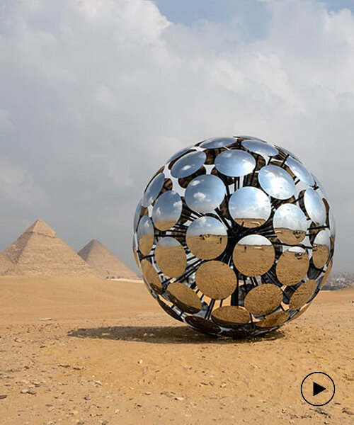 SpY’s chrome steel 'ORB' reflects giza pyramids and ancient egyptian symbology