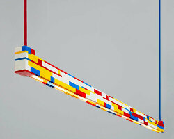 ambience studio’s repurposed LEGO brick light emanates a playful kaleidoscope of color