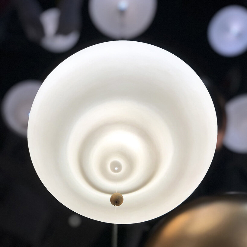 beau & bien crafts bespoke chandelier of cascading porcelain bubbles