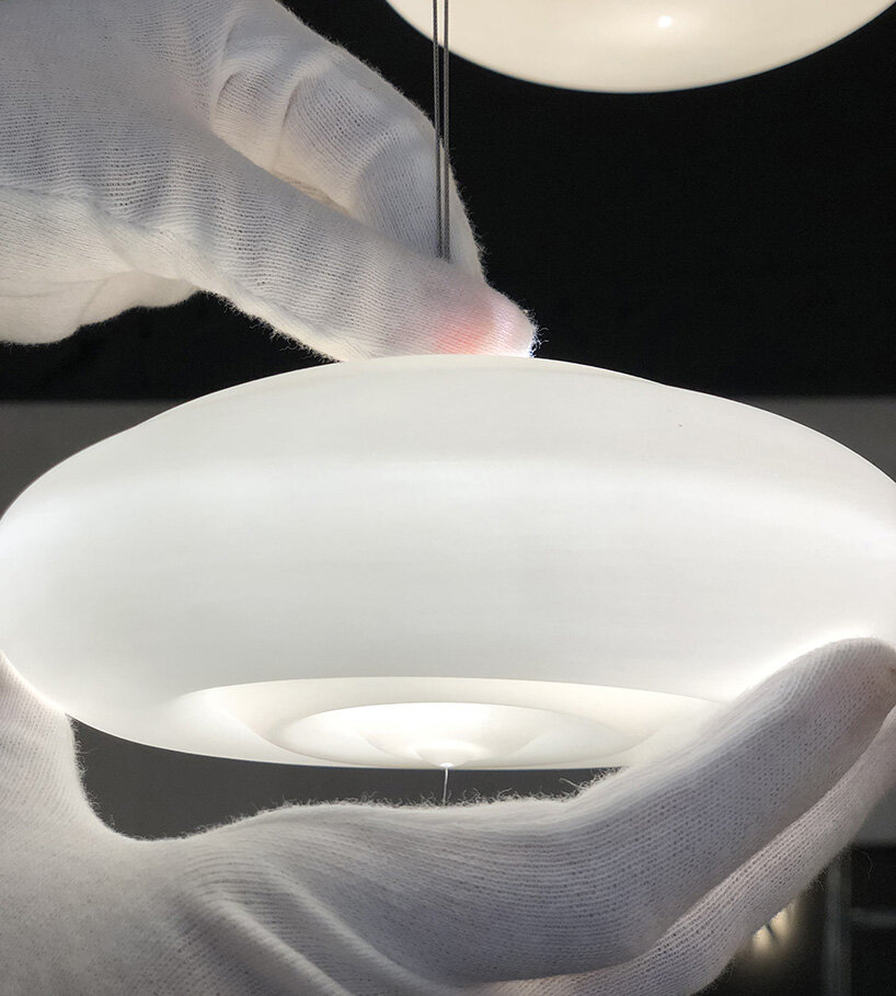 beau & bien crafts bespoke chandelier of cascading porcelain bubbles