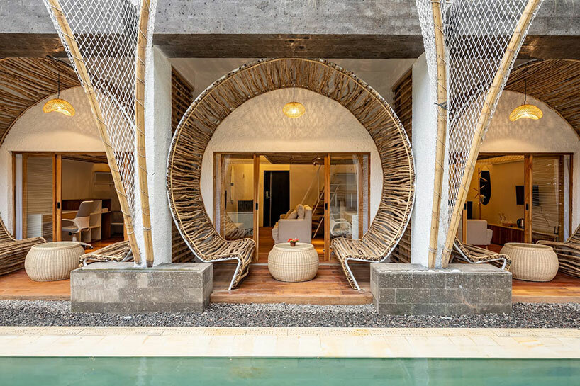 hotel renovation in bali celebrates bamboo with co-living space for digital nomads