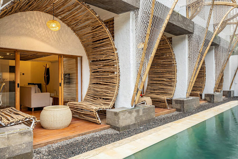 hotel renovation in bali celebrates bamboo with co-living space for digital nomads