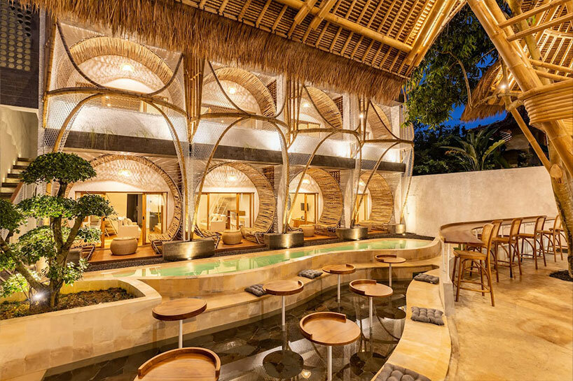 hotel renovation in bali celebrates bamboo with co-living space for digital nomads