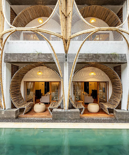 hotel renovation in bali celebrates bamboo with co-living space for digital nomads