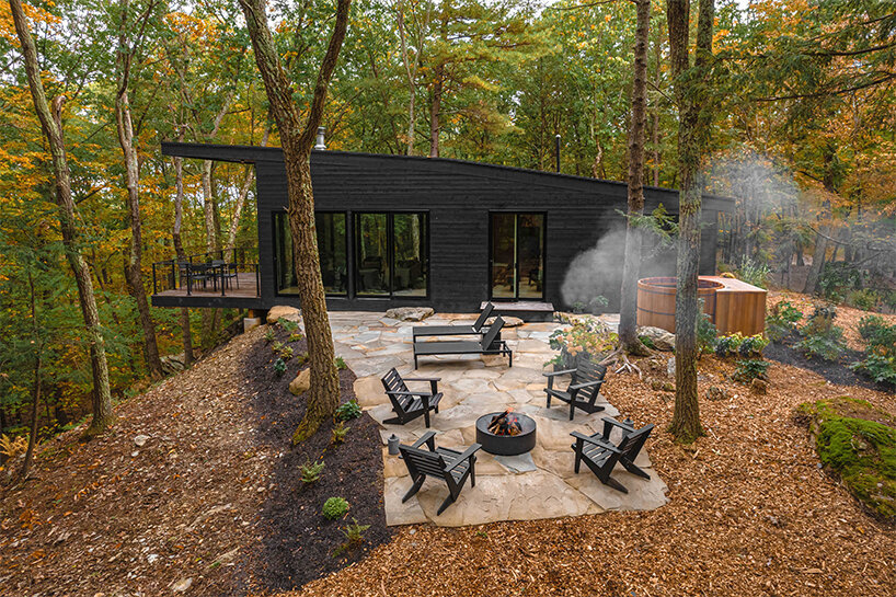 'Cabana' is a cantilevered, modernist retreat perched on a forested cliff in Rhinebeck, NY