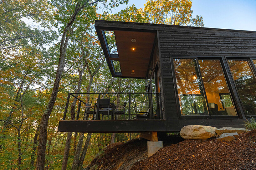 'cabana' is a cantilevered modernist retreat perched on a forest cliff in rhinebeck, NY