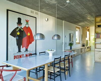 with a quiet front and extroverted rear, PAN architetti melds two tuscan homes into one