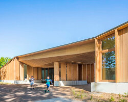 bio-based materials form playful facade for reconstructed primary school in france