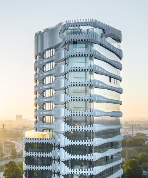 j. mayer h. wraps newly completed düsseldorf tower with a 'zipper' facade