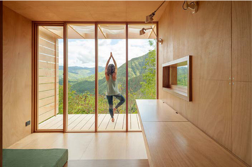 drawing from japanese teahouses + scandinavian huts, llabb builds 'hermitage' cabin in italy