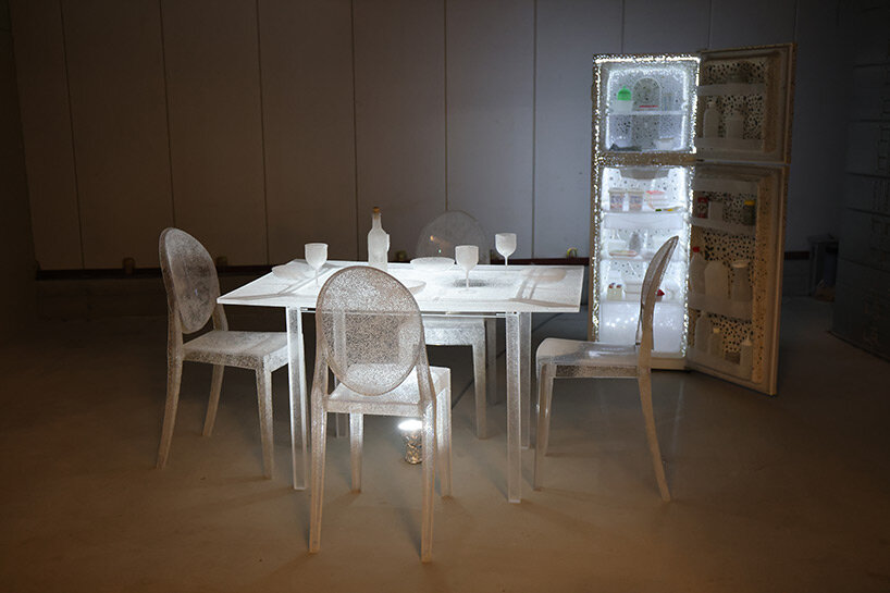 nina nomura crafts artfully perforated landscape by melting holes into plastic everyday items