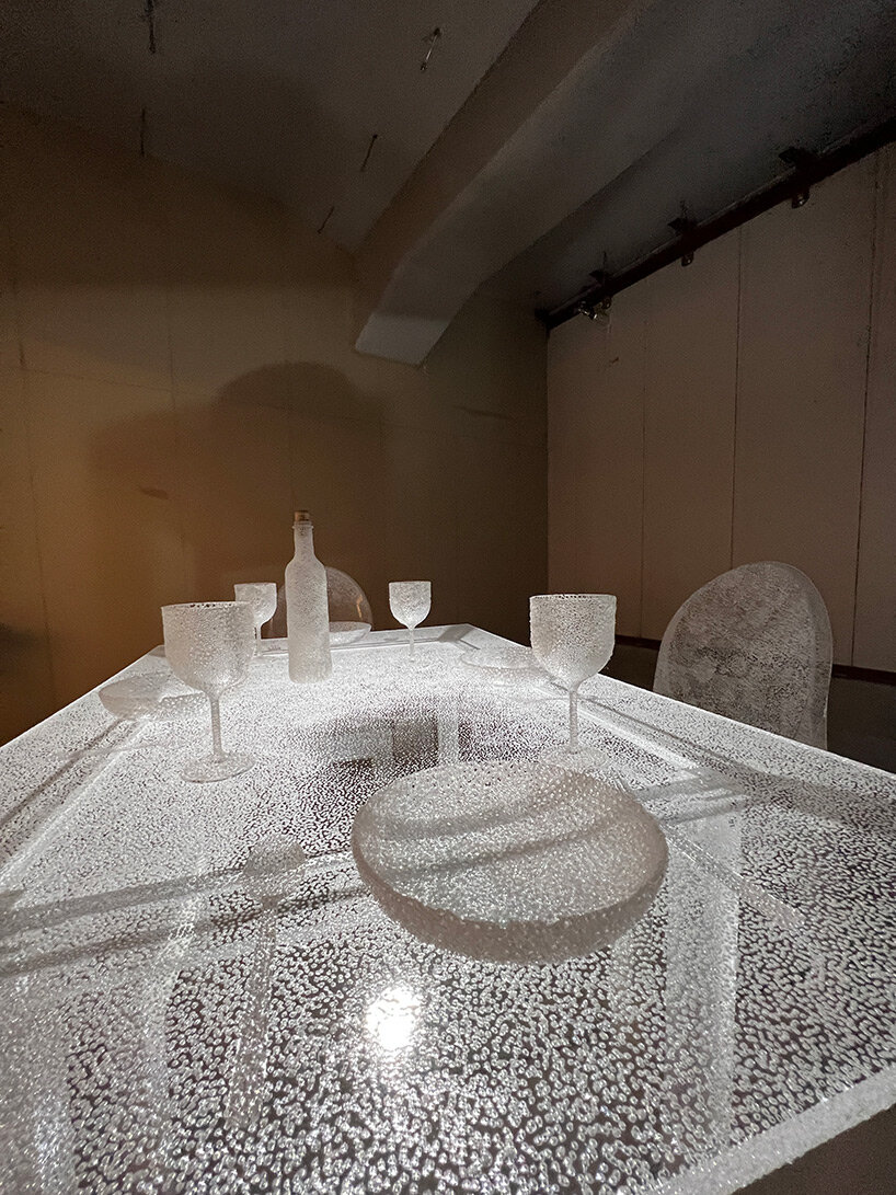 nina nomura crafts artfully perforated landscape by melting holes into plastic everyday items