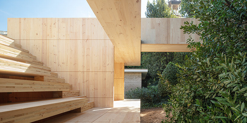 intricate timber installation 'mass is more' reinterprets mies van der rohe's barcelona pavilion