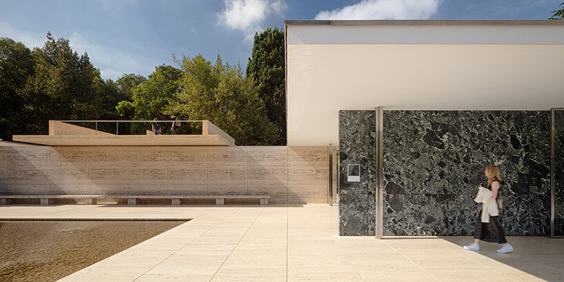 intricate timber installation 'mass is more' reinterprets mies van der rohe's barcelona pavilion