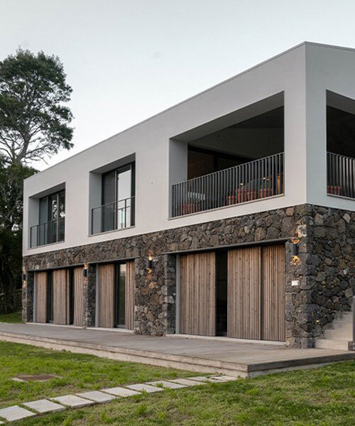 mezzo atelier completes basalt stone + concrete dwelling in são miguel island