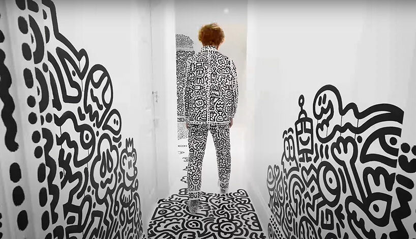 watch mr. doodle fully cover mansion in his own black and white cartoonish signature