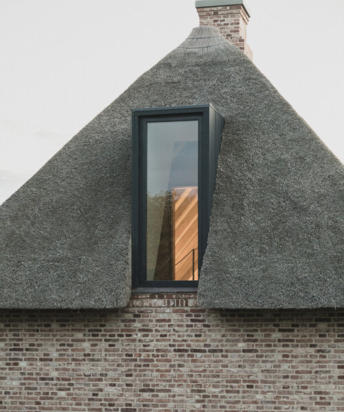 thatched brick 'nieby crofters cottage' transformed with modern glass renovation