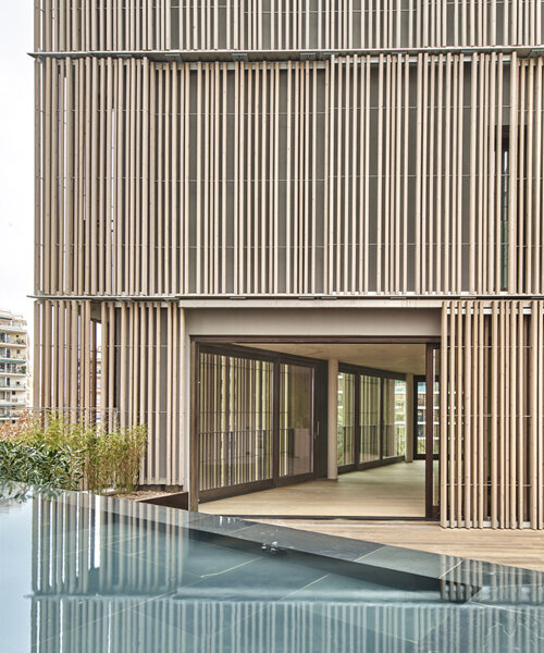 OHLAB fronts new residential complex in palma with sliding wood panels