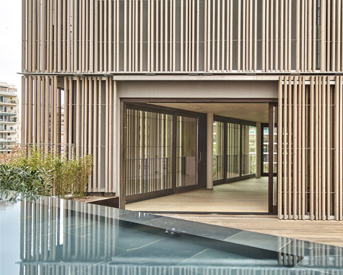 OHLAB fronts new residential complex in palma with sliding wood panels