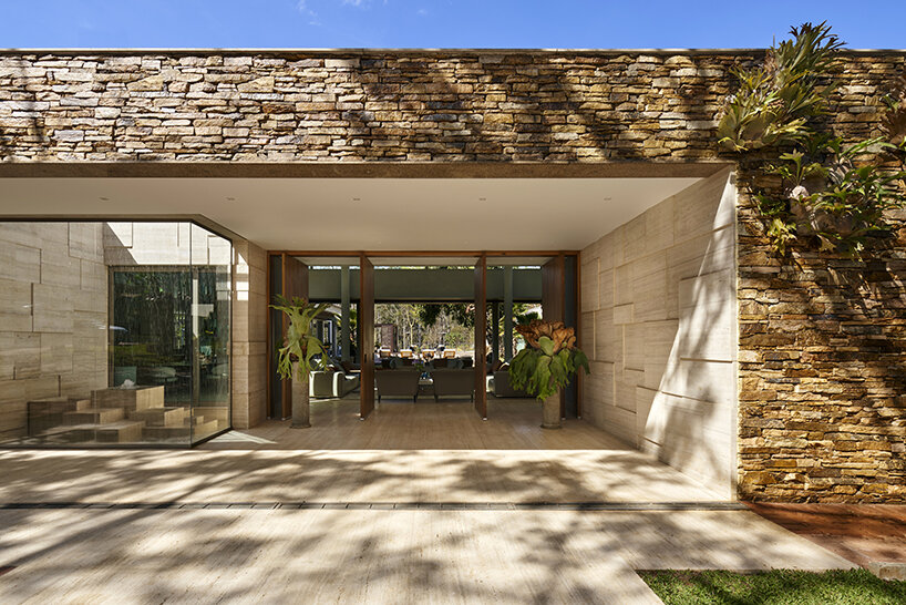 'orchid house' by david guerra doubles as a natural sanctuary in brazil