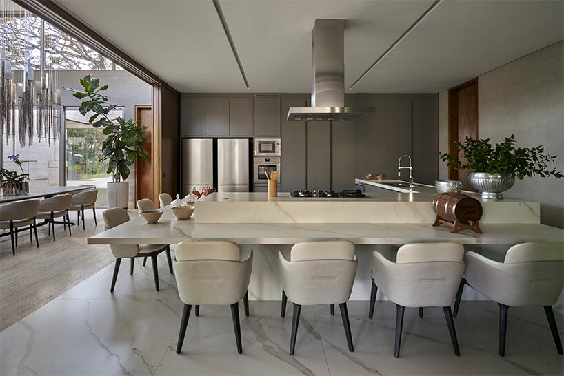 'orchid house' by david guerra doubles as a natural sanctuary in brazil