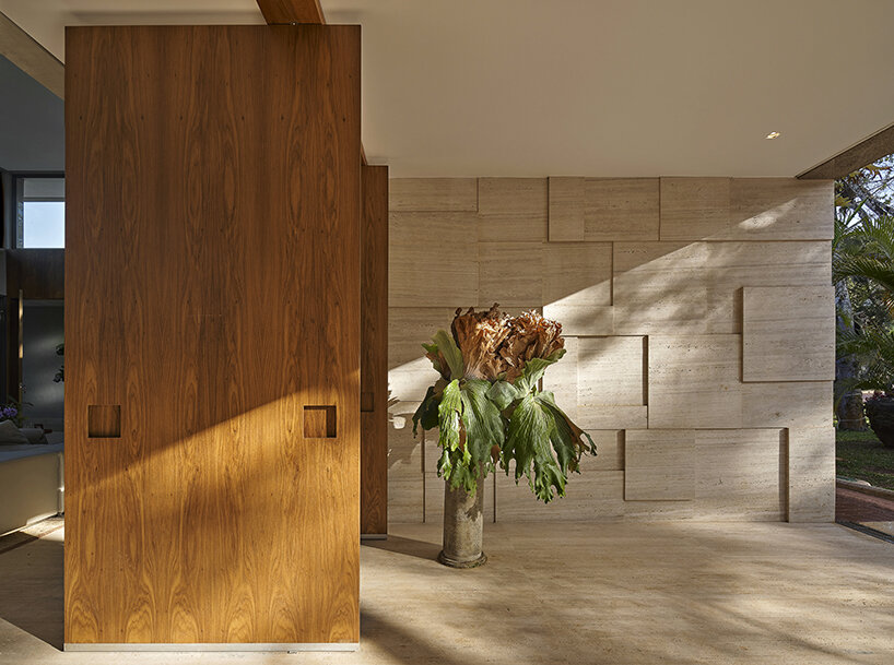 'orchid house' by david guerra doubles as a natural sanctuary in brazil