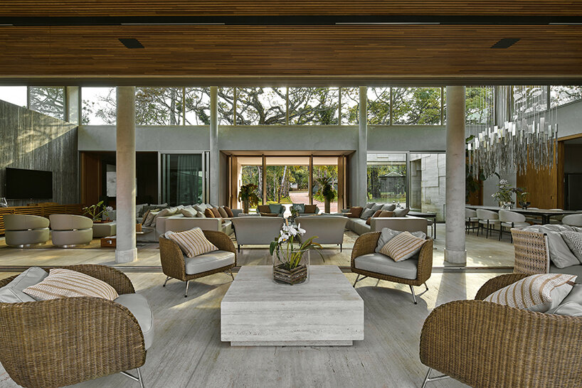 'orchid house' by david guerra doubles as a natural sanctuary in brazil