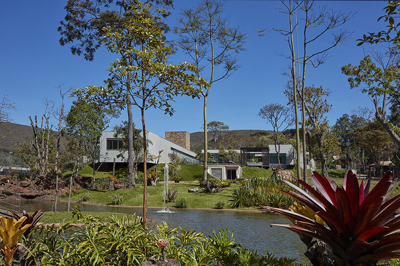 'orchid house' by david guerra doubles as a natural sanctuary in brazil