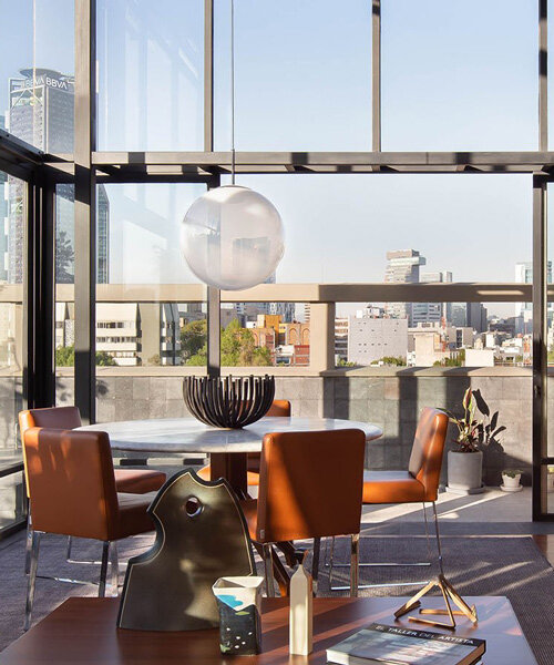 modern penthouse overlooking mexican cityscape encapsulates the international style