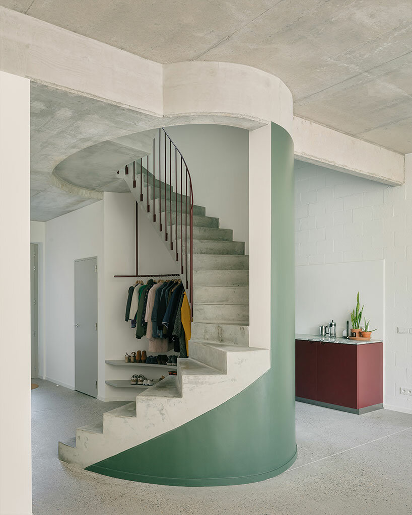 delicate lines and curves engage in visual play within minimal house in belgium