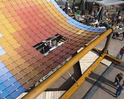 undulating solar pavilion shelters visitors and harvests sunlight at dutch design week
