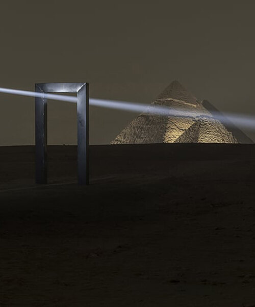 transcendent installation ‘portal of light’ illuminates ancient pyramids of giza