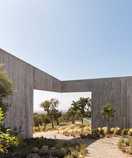 geometric cut-outs frame atlantic views for aires mateus' concrete 'pa.te.os' in portugal