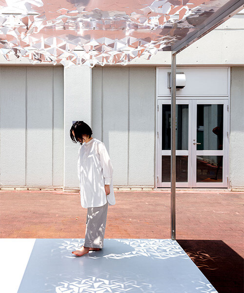 drawing from japanese paper cutting art, the auxetic pavilion filters sunlight like a tree