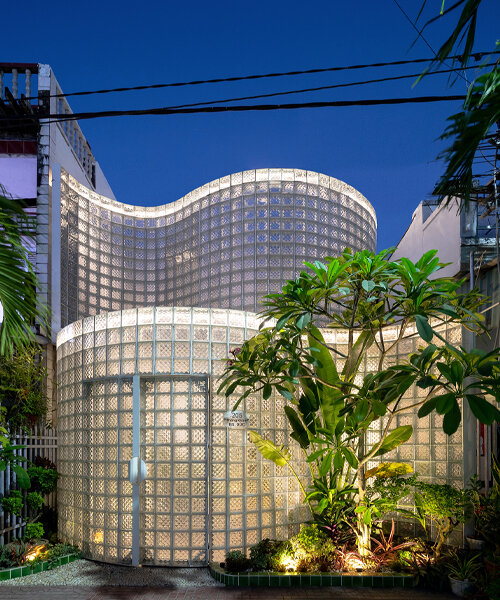 a renovated glass-brick volume, 'coco house' in vietnam evokes otherworldly nostalgia
