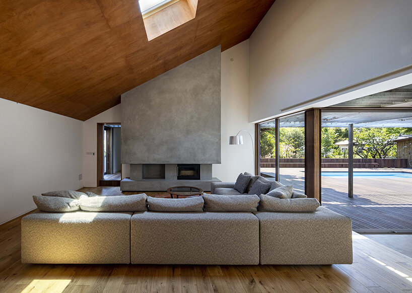 key operation inc. composes private japanese residence as a cluster of wooden huts