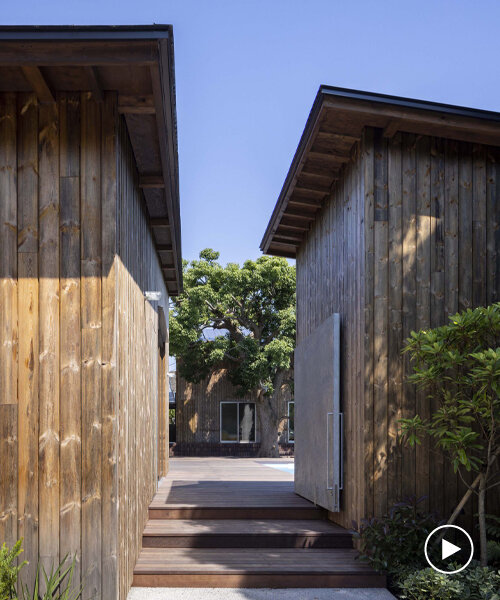 key operation inc. composes private japanese residence as a cluster of wooden huts