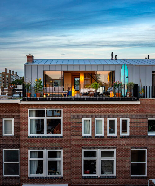 'house on a house' steel roof extension pops up in hague's brick cityscape