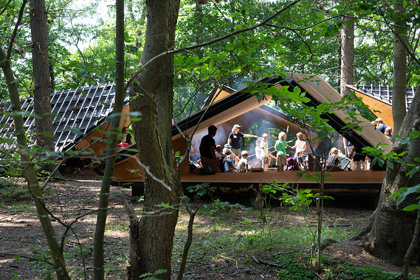 Woodsy Modern Micro-Shelter in Québec with Timeless Triangular Charm