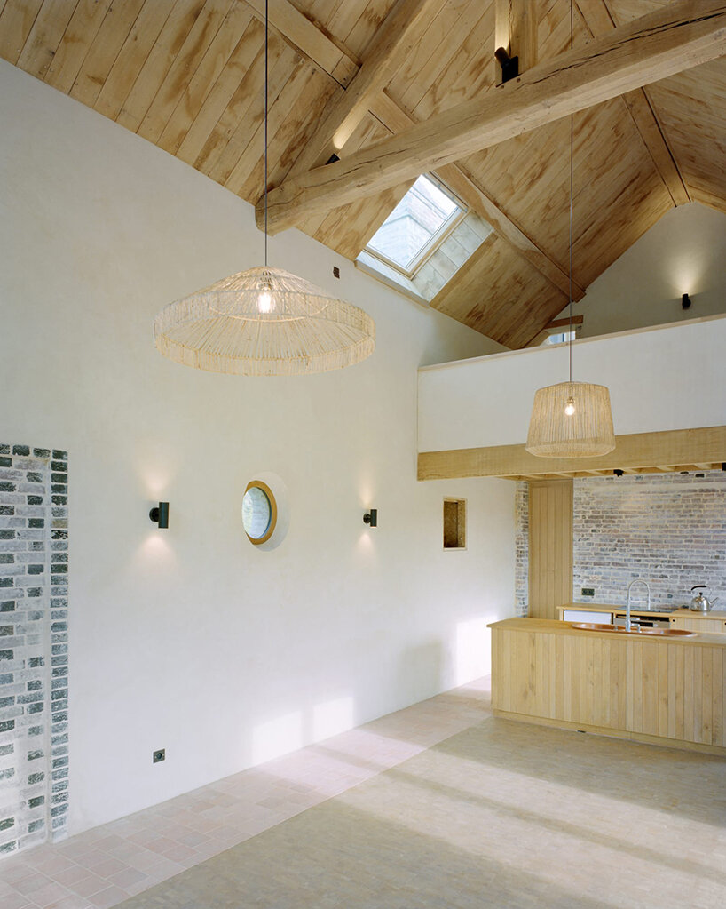 This traditional brick home has been brought to life in Normandy using only natural materials
