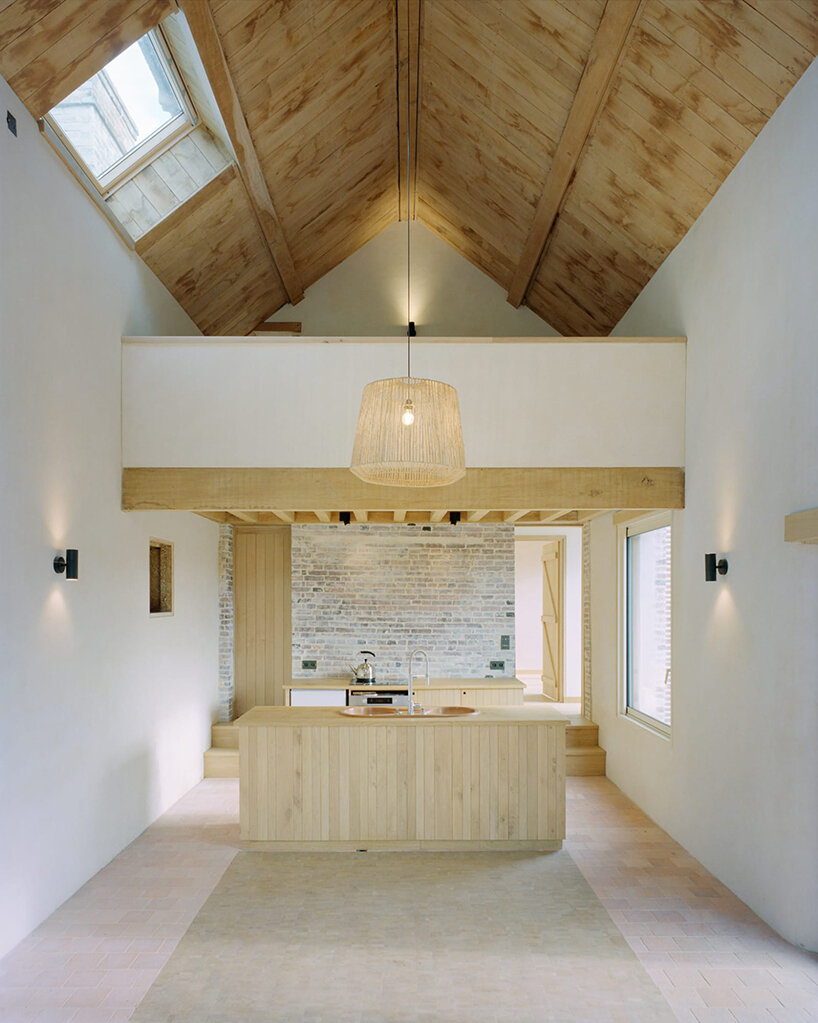 using only natural materials, this traditional brick house is given new life in normandy