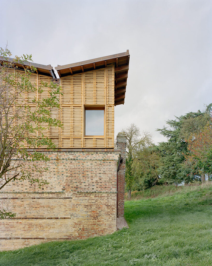 using only natural materials, this traditional brick house is given new life in normandy