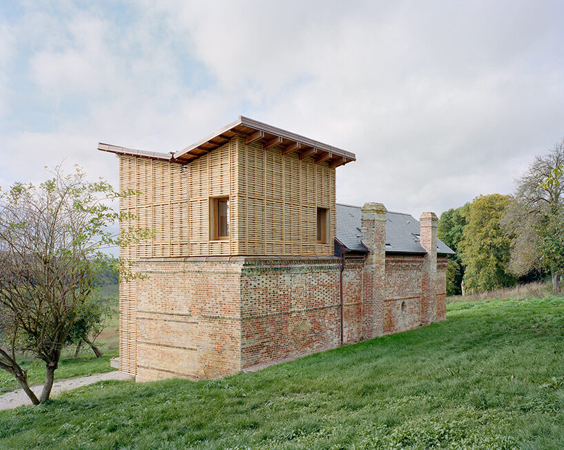 using only natural materials, this traditional brick house is given new life in normandy