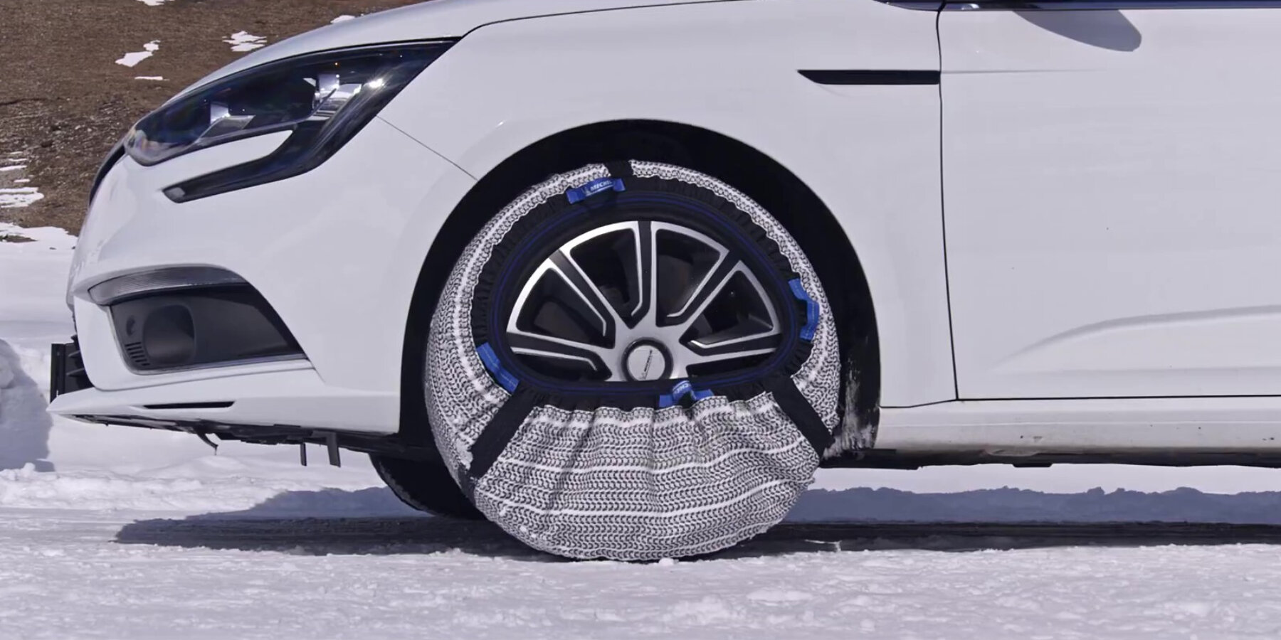 michelin SOS grip' tire socks stop cars from tumbling on snowy roads