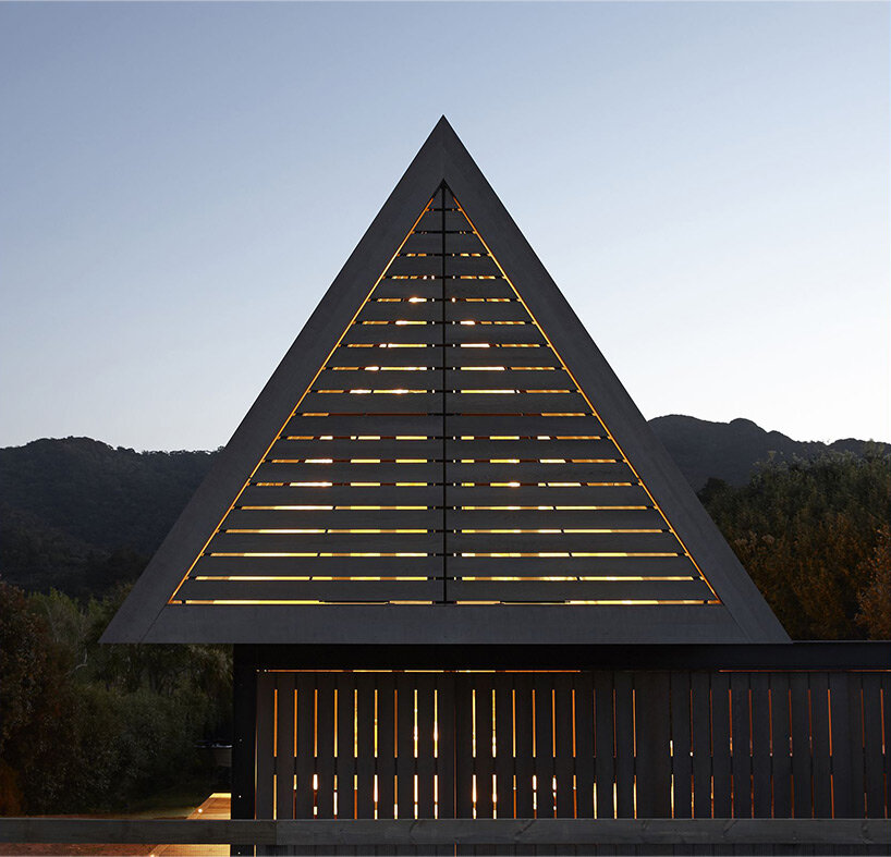 A-frame cabin in new zealand pays respect to local coastal landscape and maori culture