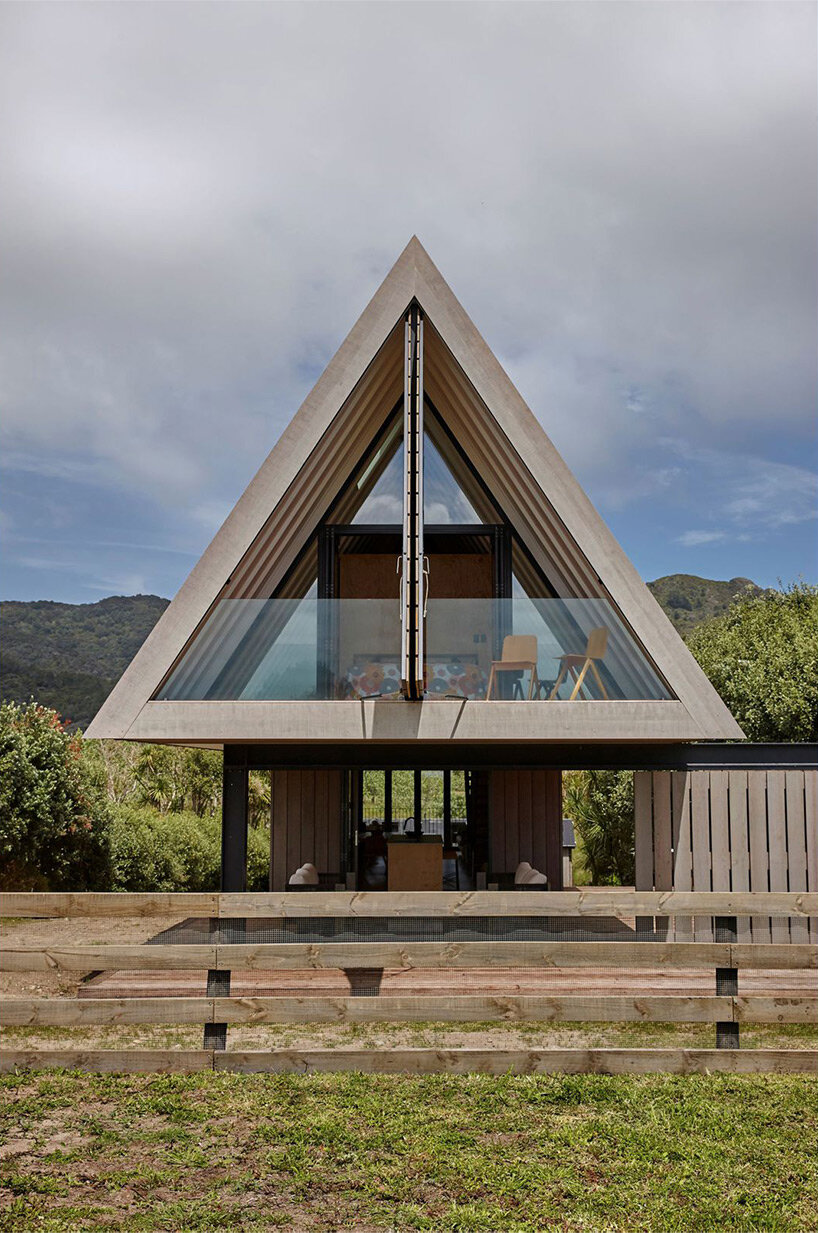 A-frame cabin in new zealand pays respect to local coastal landscape and maori culture