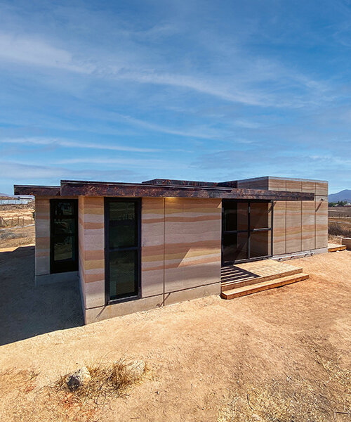 clad in rammed earth + burnt wood, 'santerra house' echoes the arid mexican landscape