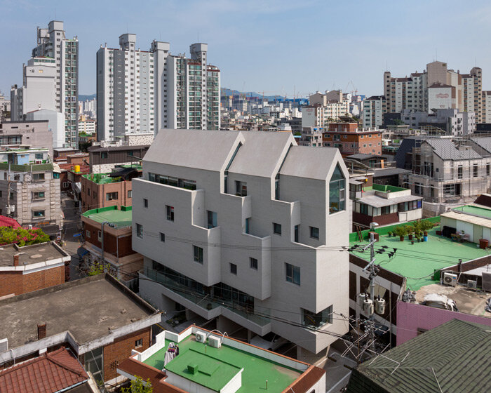 SOSU architects completes fragmented 'T-roof' apartments in south korea
