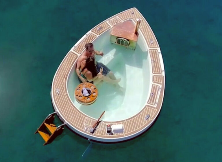 hot tub boat 'spacruzzi' drifts on the sea with gaspowered fireplace stove