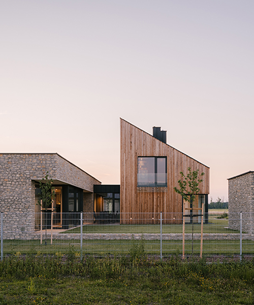staruń wanik architects combines three blocks clad in wood and stone into polish residence